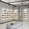 Estantes de exhibición hermosos de la zapatería/jerárquico montado en la pared del estante del zapato del tacón alto proveedor