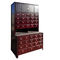 Gabinete de almacenamiento chino de la exhibición de la tienda de la farmacia de madera sólida modular con el cajón proveedor
