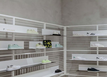 Ahorra la exhibición montada en la pared del zapato del espacio con fuerza de sustentación fuerte material del hierro proveedor