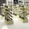Exhibición al por menor de madera de alta densidad del estante del zapato 4 capas de la grieta anti para el centro comercial grande proveedor